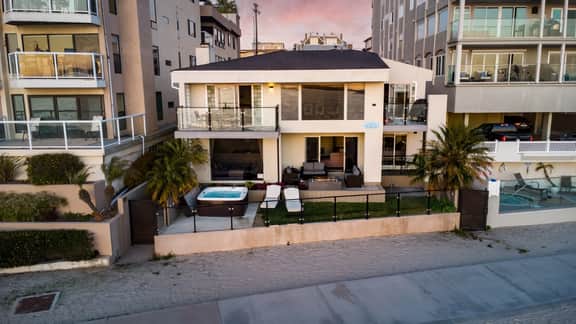 Stunning Bayfront Home + Private Beach Access + Hot Tub + Fire Pit