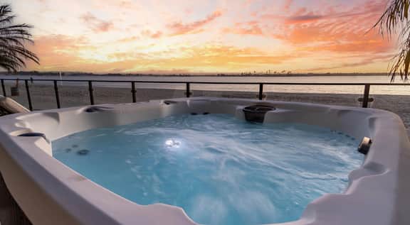 Stunning Bayfront Home + Private Beach Access + Hot Tub + Fire Pit
