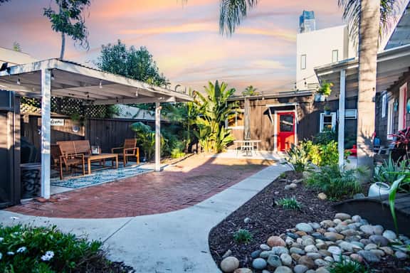 Laid-Back Vintage Beach Cottage Escape | Large Patio