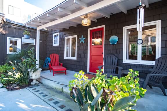 Laid-Back Vintage Beach Cottage Escape | Large Patio